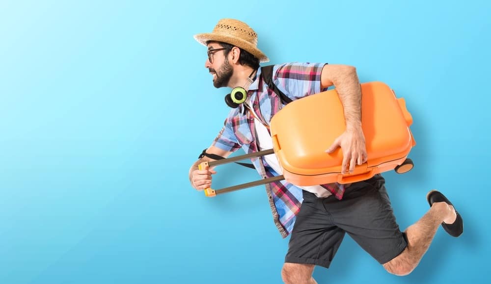 Tourist running fast over colorful background